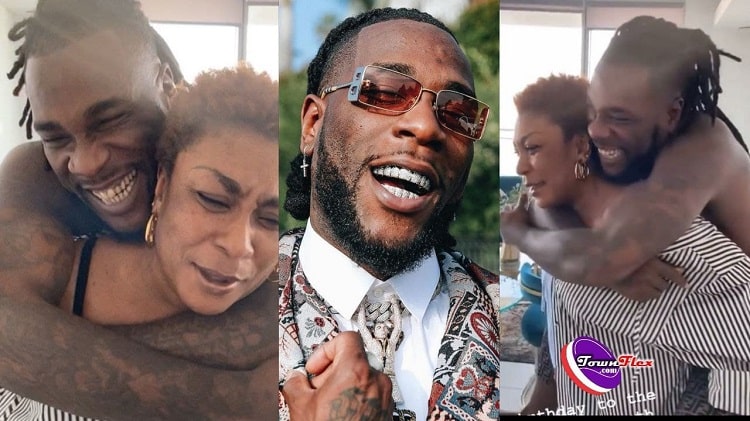 Burna Boy 30th Birthday: Watch Moments As Mama Carry Son On Her Back During Celebration (Watch Video)