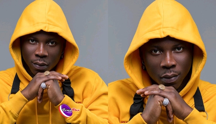 Stonebwoy snatches phone from fan filming the private part of his dancer on stage (Watch Video)