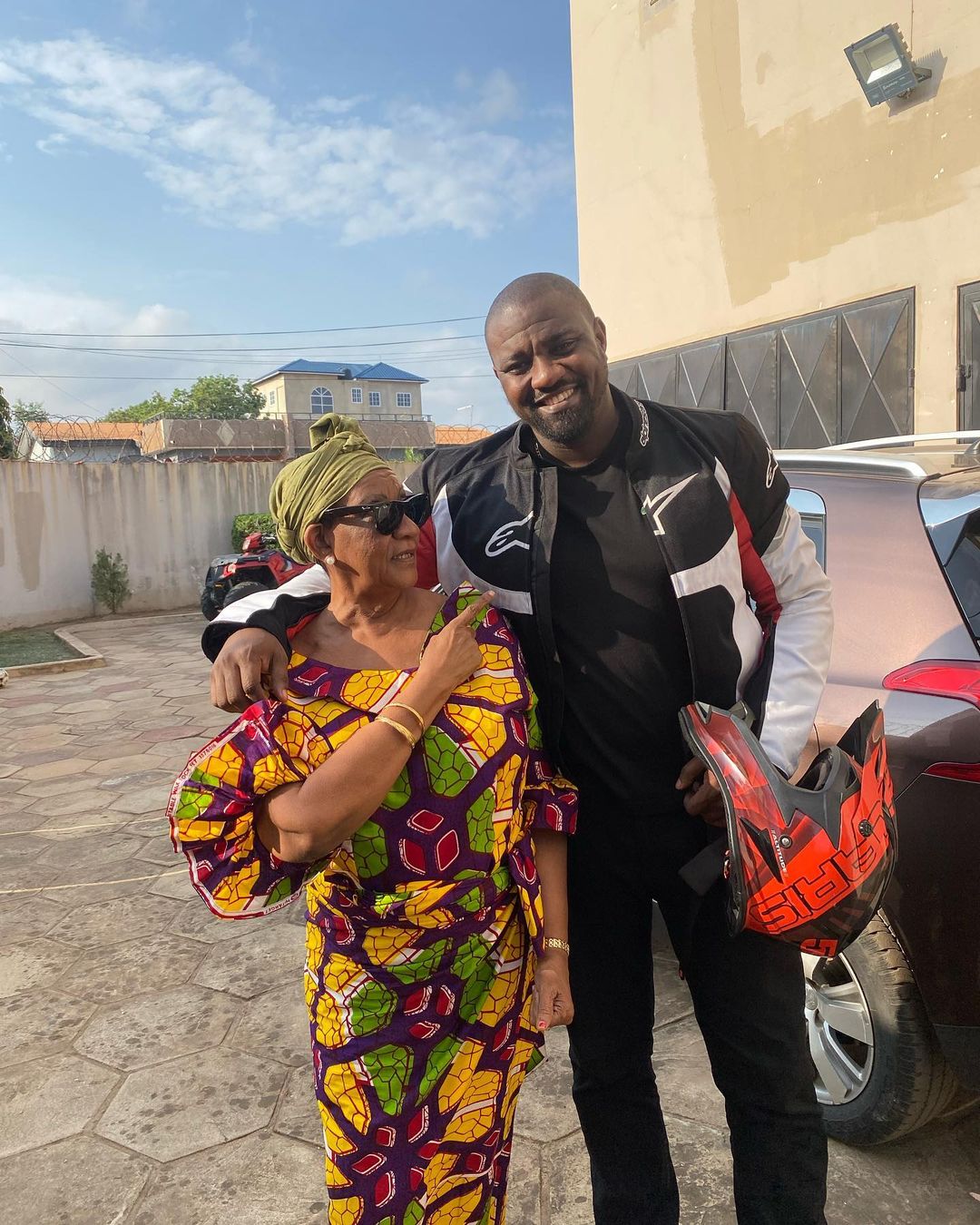 John Dumelo and his mother Mother, Mrs Antoinette Ama Ampomah Dumelo who is celebrating 70th birthday