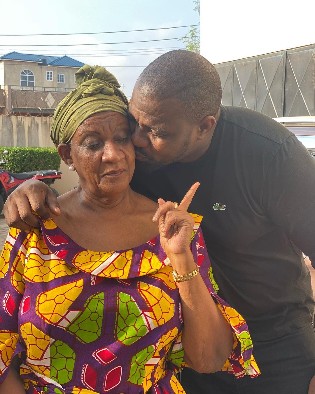 John Dumelo and his mother Mother, Mrs Antoinette Ama Ampomah Dumelo who is celebrating 70th birthday