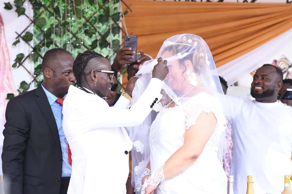 Patapaa Marks One-Year Wedding Anniversary With Lovely Photos, Praises Wife, Liha Miller [See Photos]