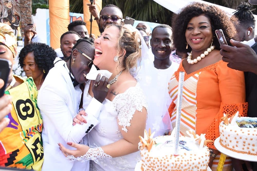 Patapaa Marks One-Year Wedding Anniversary With Lovely Photos, Praises Wife, Liha Miller [See Photos]