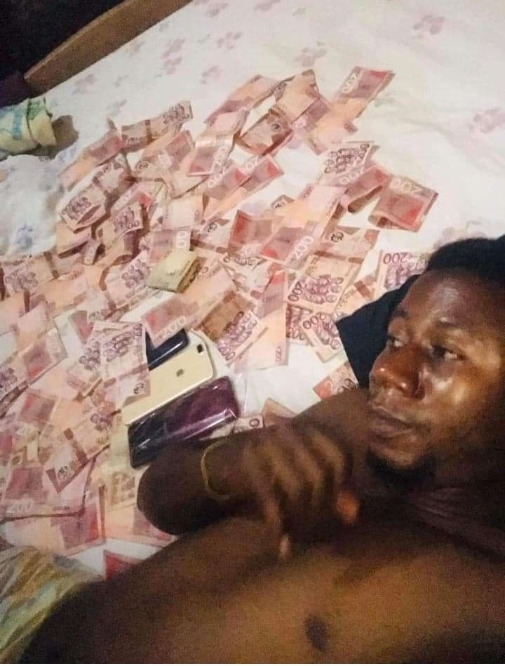 Appiah with pile of cash