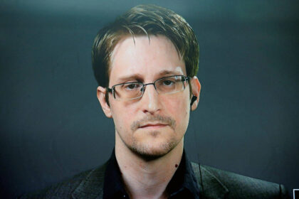 Vladimir Putin gives NSA's Edward Snowden Russian citizenship