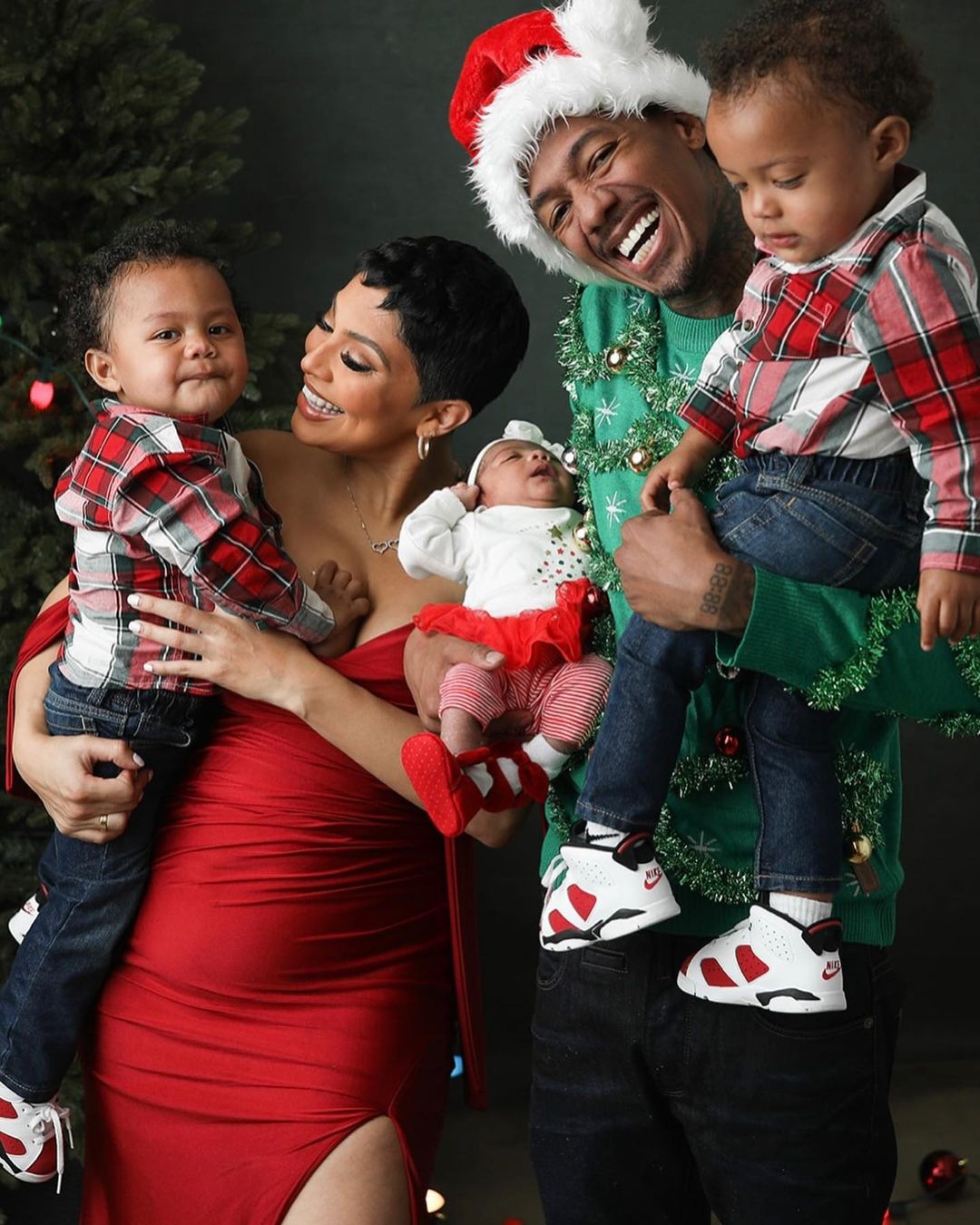 Nick Cannon Dresses As Santa Claus For Christmas With Bre Tiesi And Son 