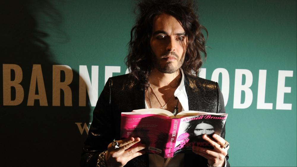 Russell Brand’s Book Publishing Deal Paused Following Sexual Assault Allegations