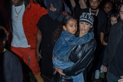 Kanye West's Wife, Bianca Censori, Holds Daughter Chicago at Album Premiere (+PHOTOS)