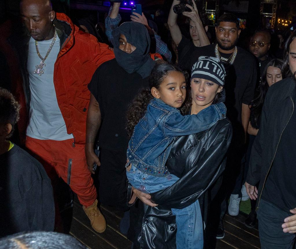 Kanye West's Wife, Bianca Censori, Holds Daughter Chicago at Album Premiere (+PHOTOS)