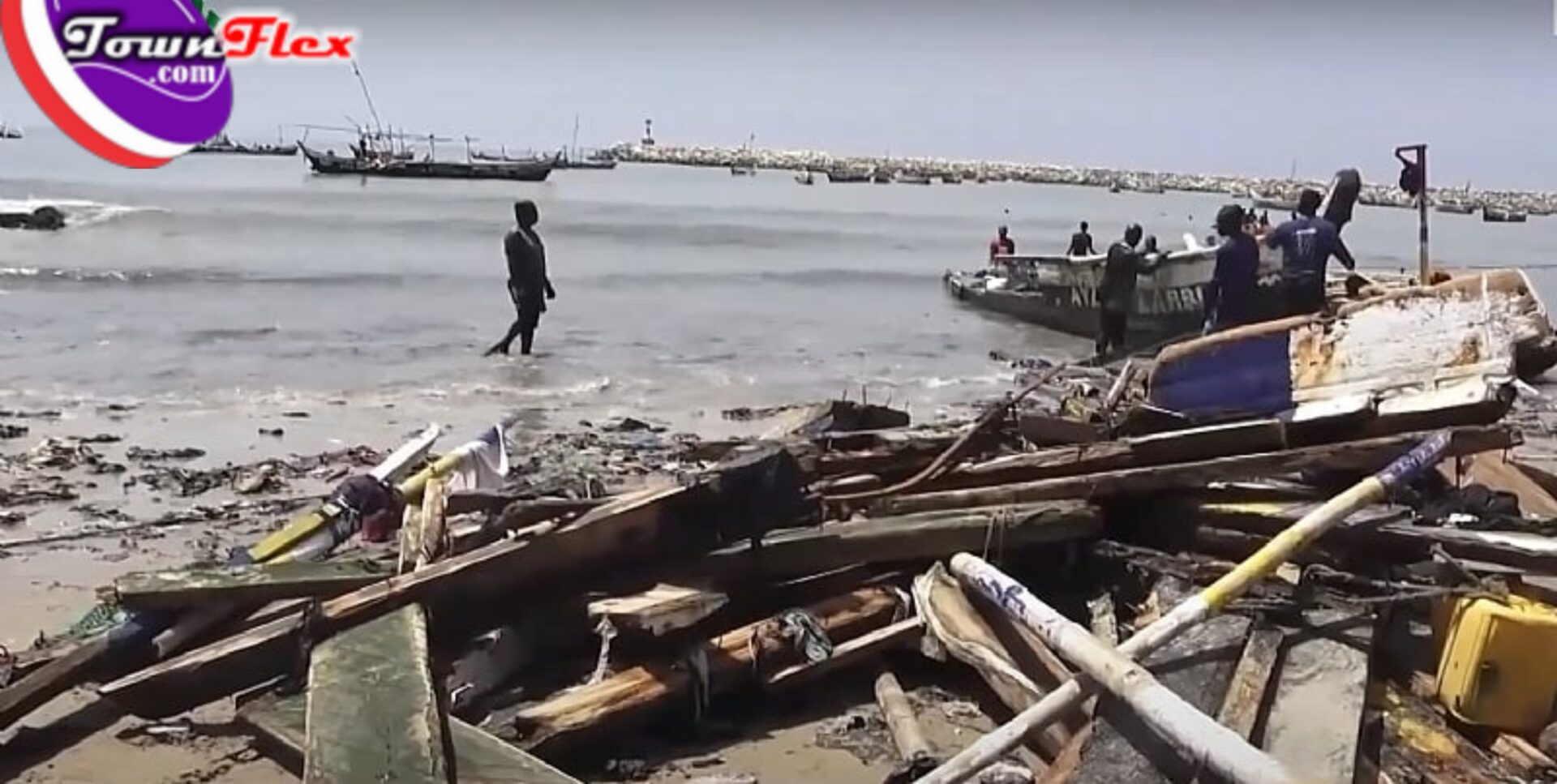 Jamestown fishermen appeal for assistance following destruction of canoes in Tuesday's heavy rain.