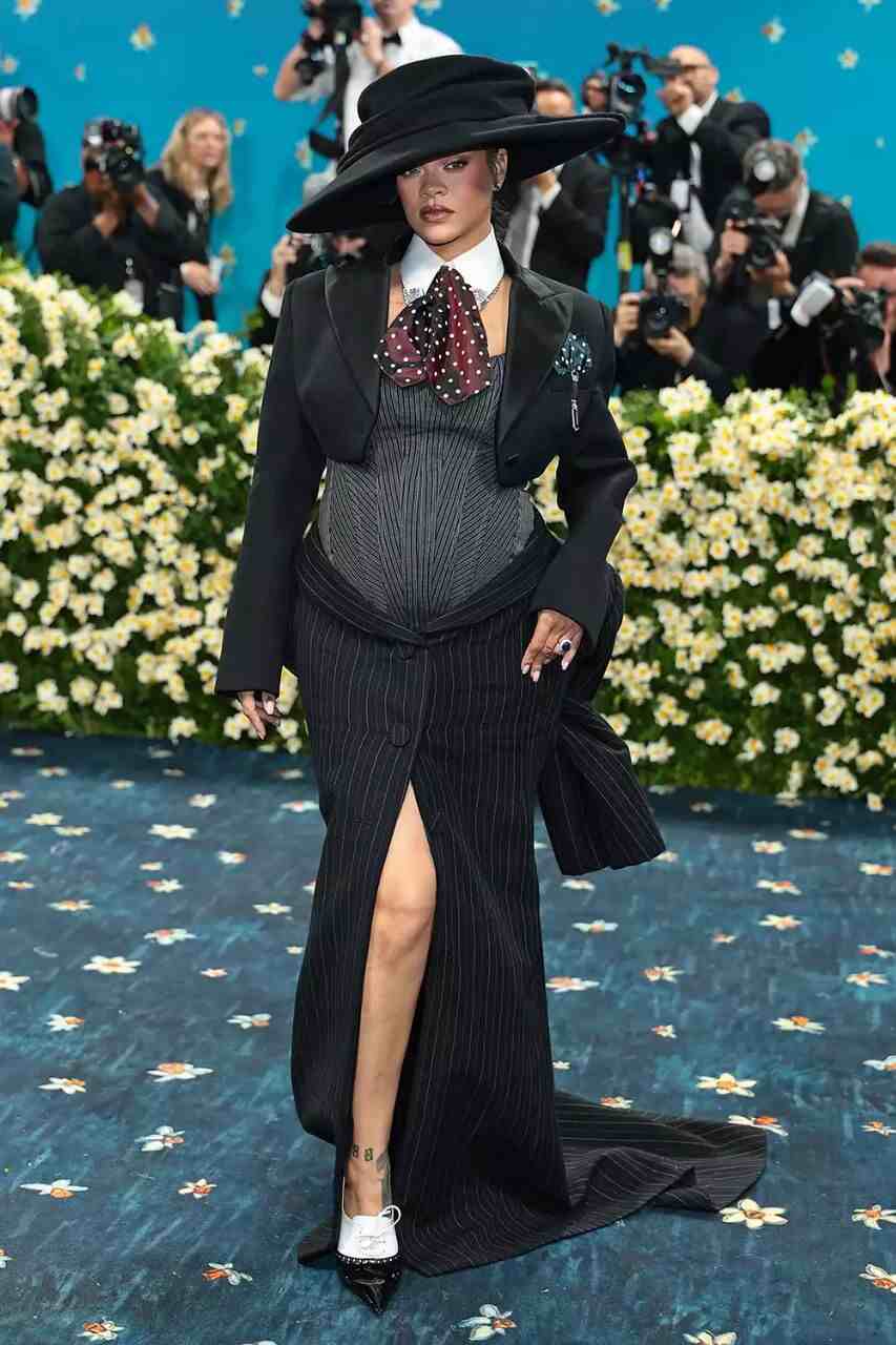 Pregnant Rihanna and A$AP Rocky Expecting 3rd Child 3 A Picture of Rihanna at the 2025 Met Gala showing off her baby bump and confirmed she is pregnant