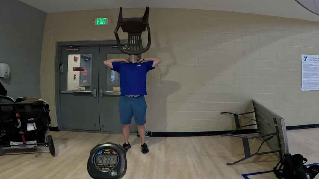 David Rush Wins Guinness World Record for long chair on chin balance